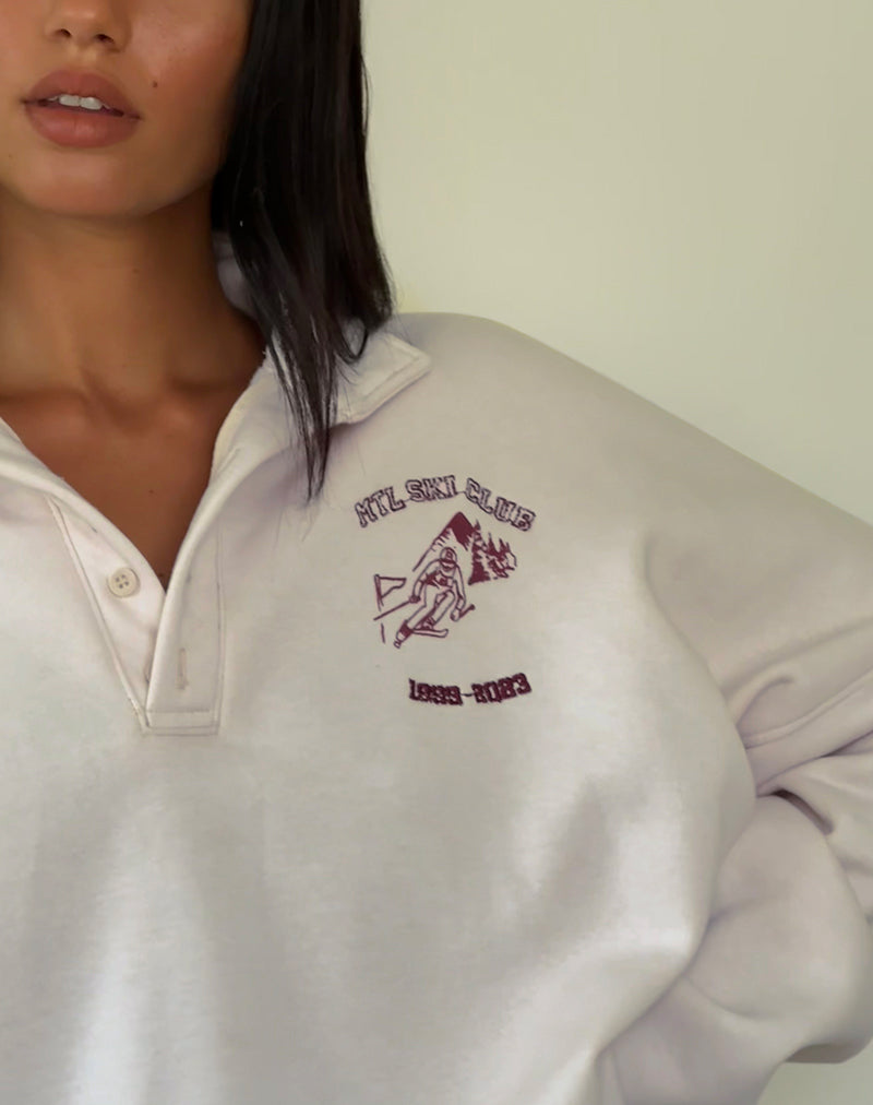 Image de Varsity Jacket en blanc d'hiver avec broderie noire du club de ski