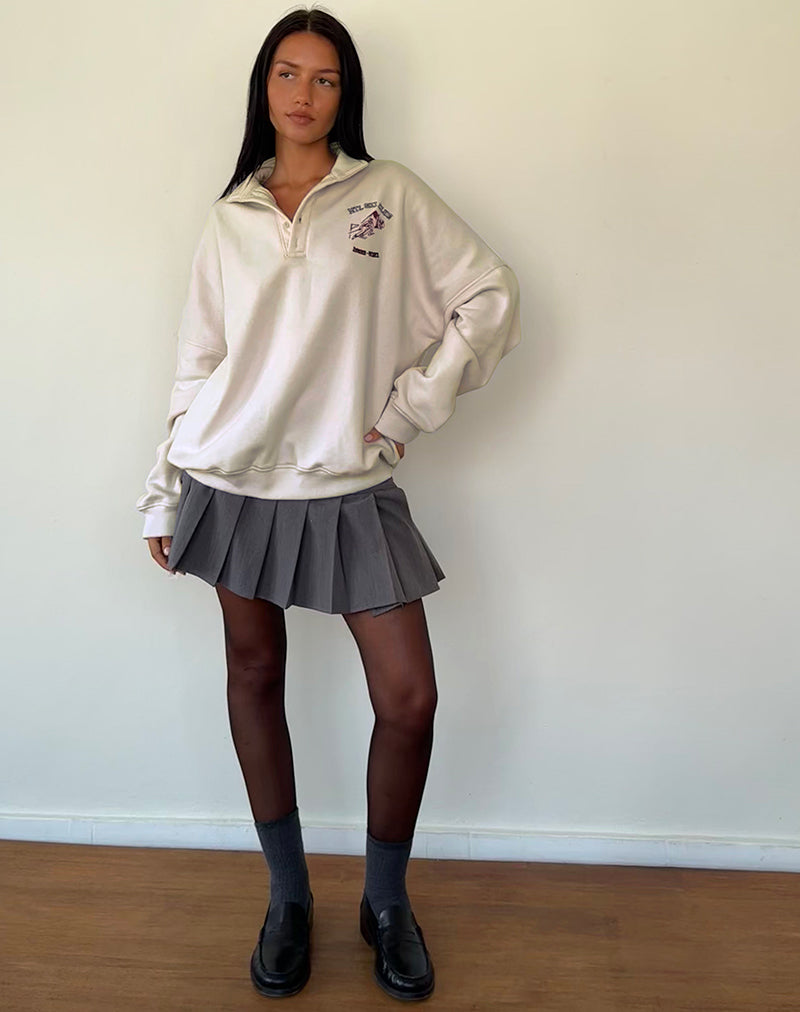 Image de Varsity Jacket en blanc d'hiver avec broderie noire du club de ski