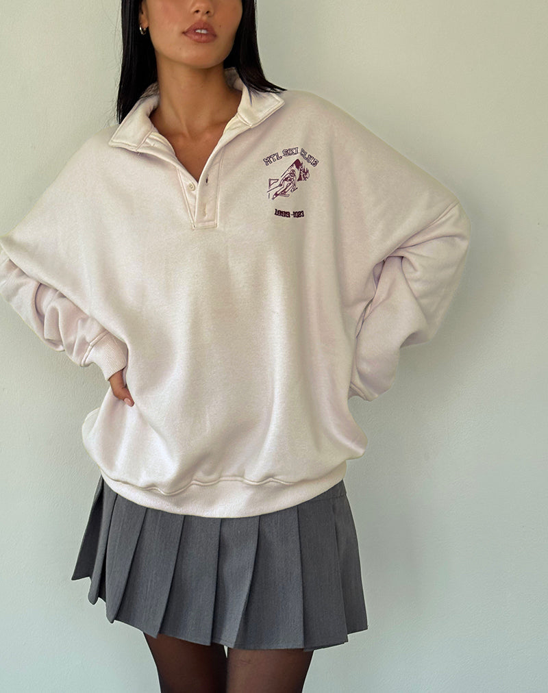 Image de Varsity Jacket en blanc d'hiver avec broderie noire du club de ski