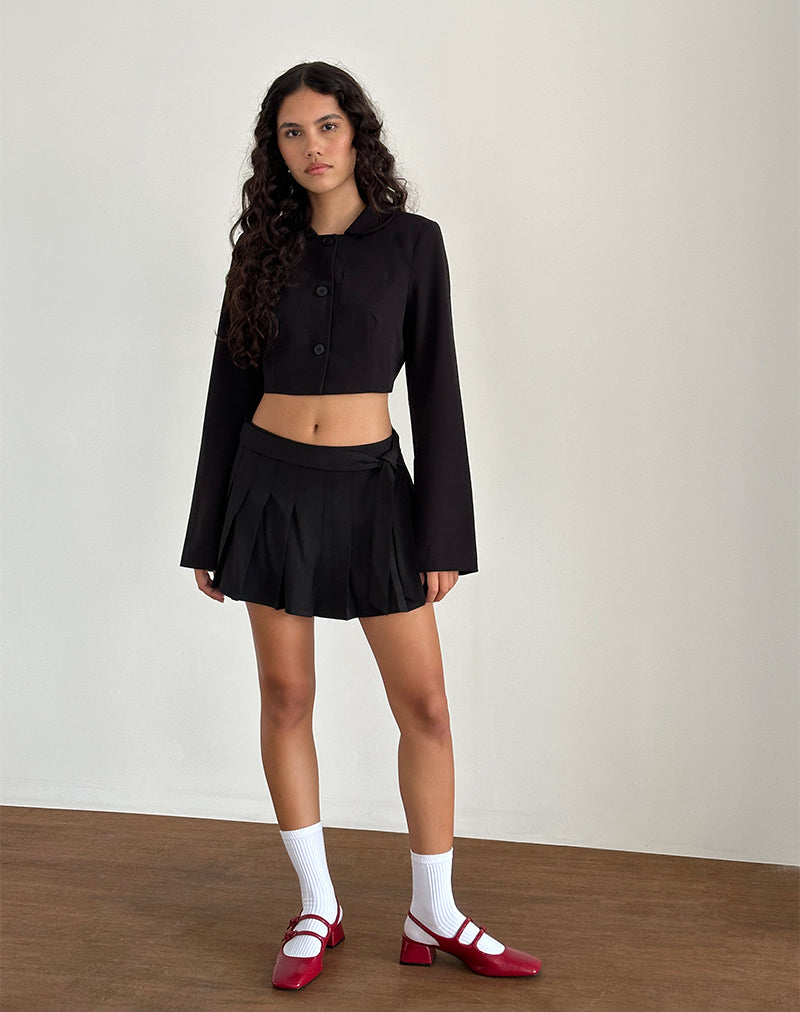 Image de la mini-jupe plissée Zekira en noir