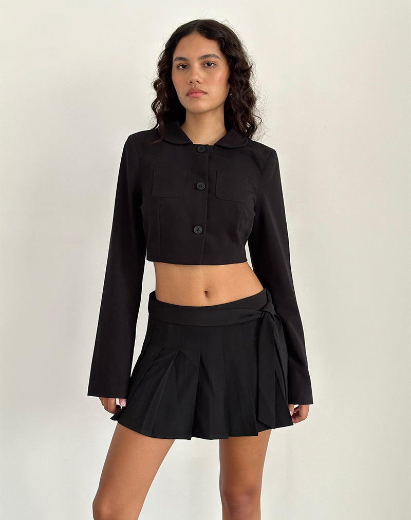 Image de la mini-jupe plissée Zekira en noir