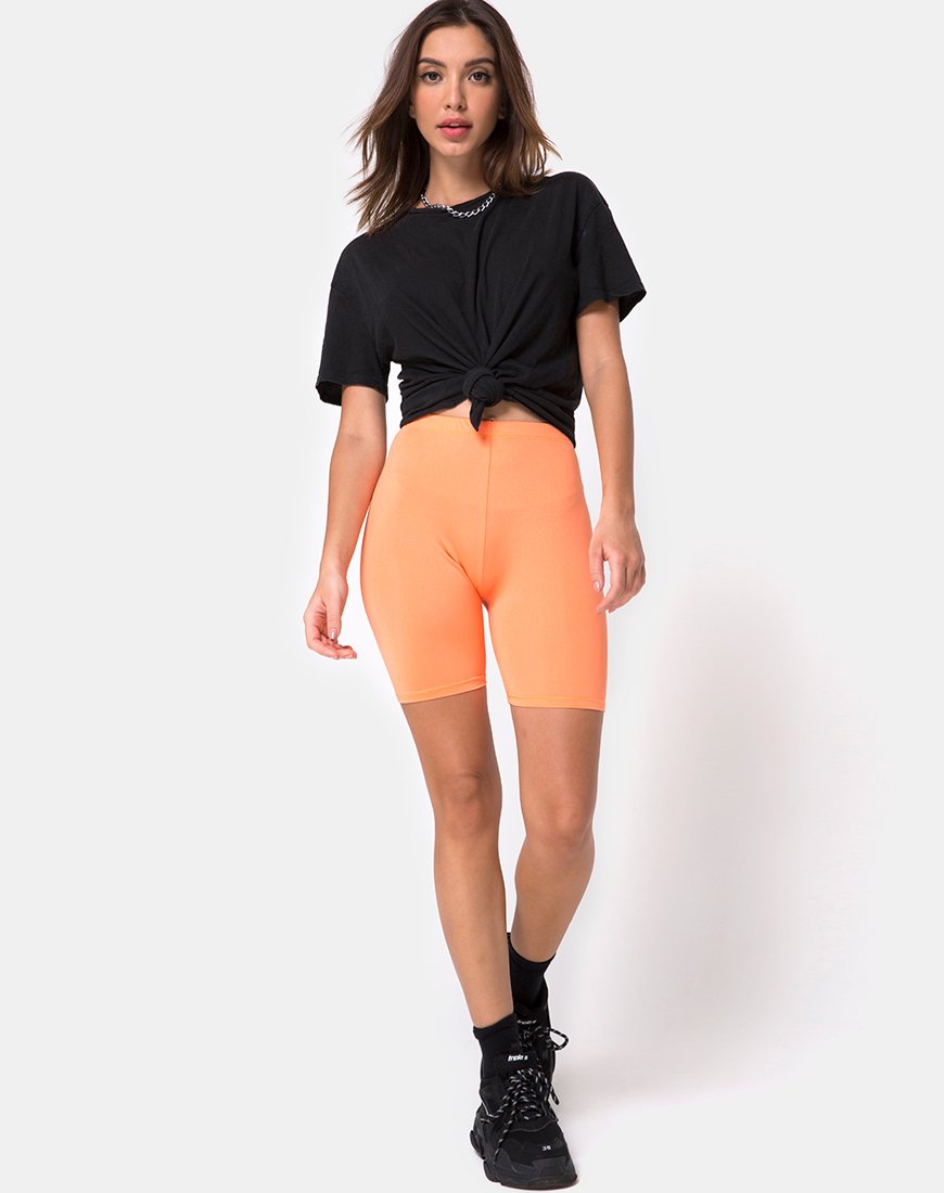 Image du short de cyclisme en orange fluo