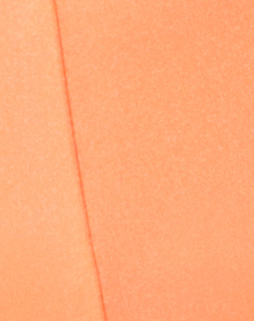 Image du short de cyclisme en orange fluo