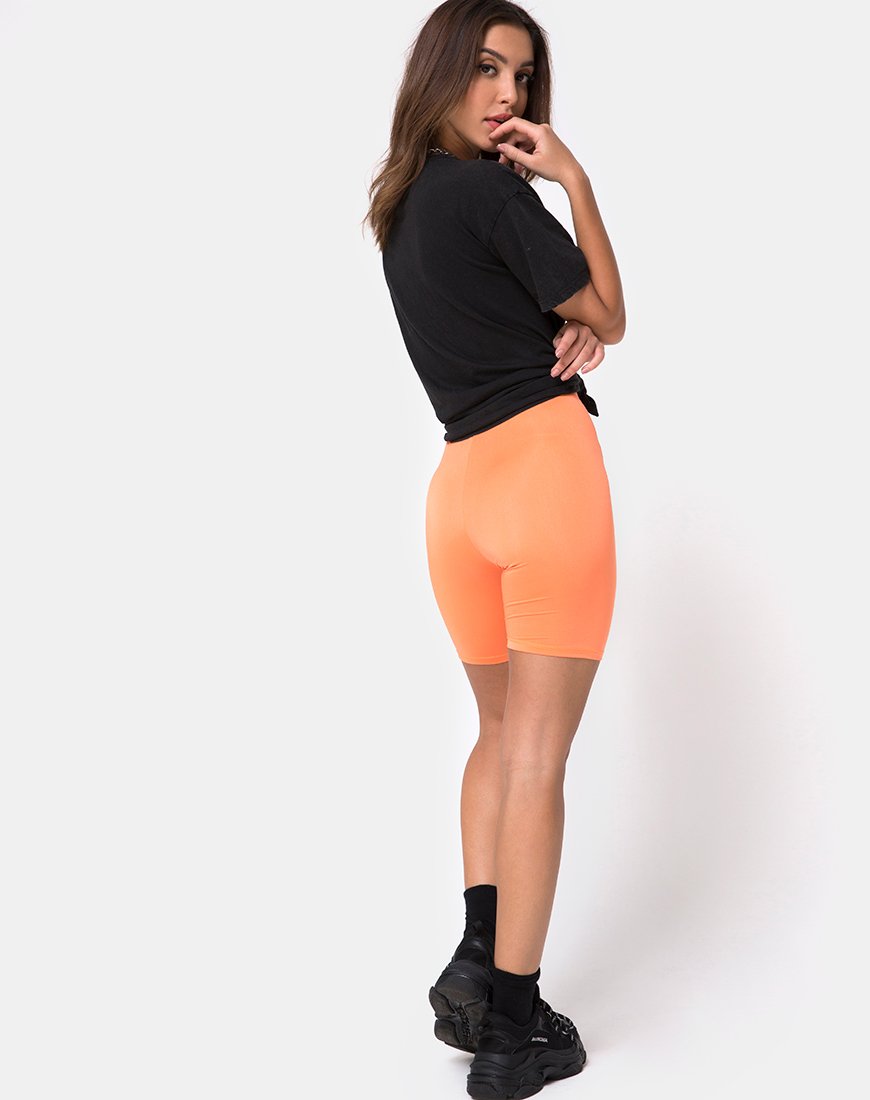 Image du short de cyclisme en orange fluo