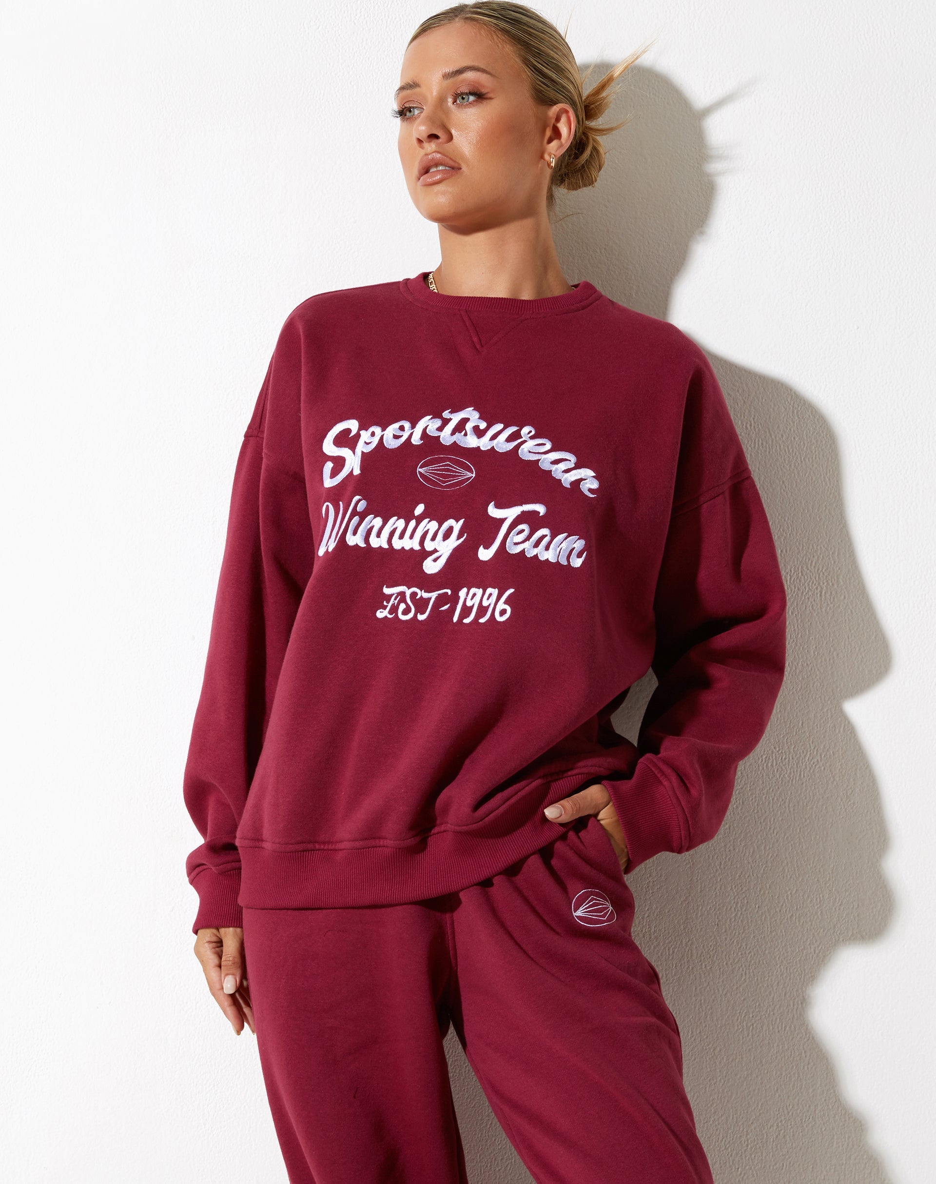 image de Glan Sweatshirt en Bourgogne avec broderie "Winning Team