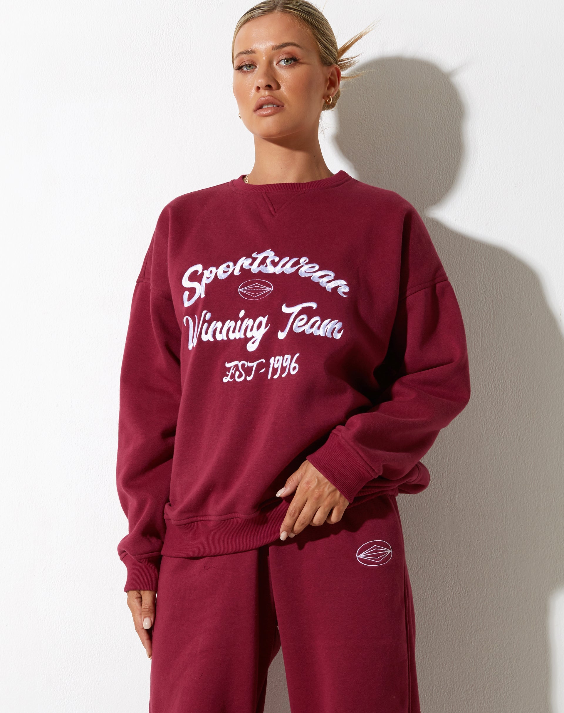 image de Glan Sweatshirt en Bourgogne avec broderie "Winning Team