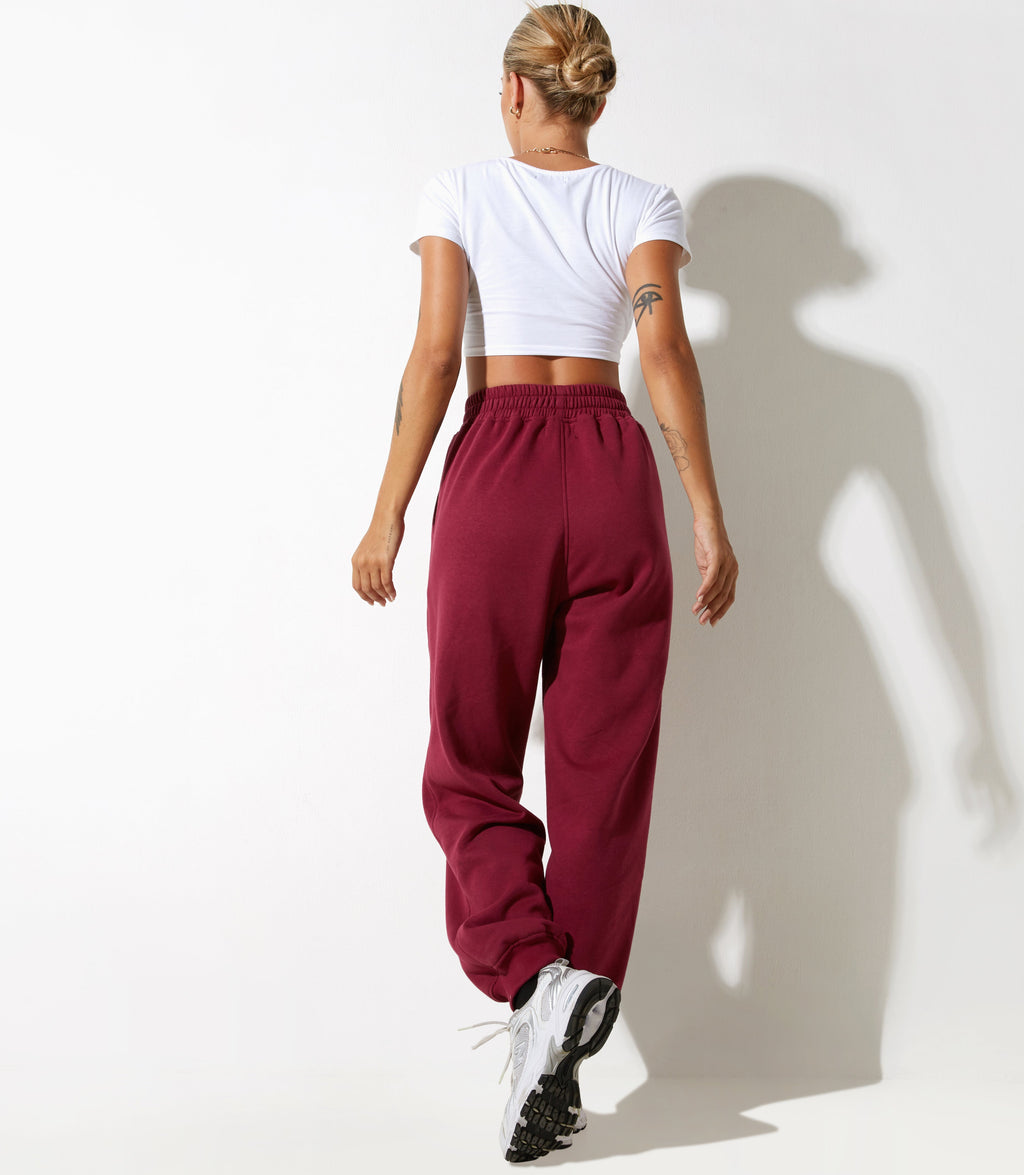 Pantalon de jogging Roider en bourgogne avec broderie 'Winning Team