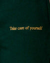 Vert bouteille avec Take Care Of Yourself Embro