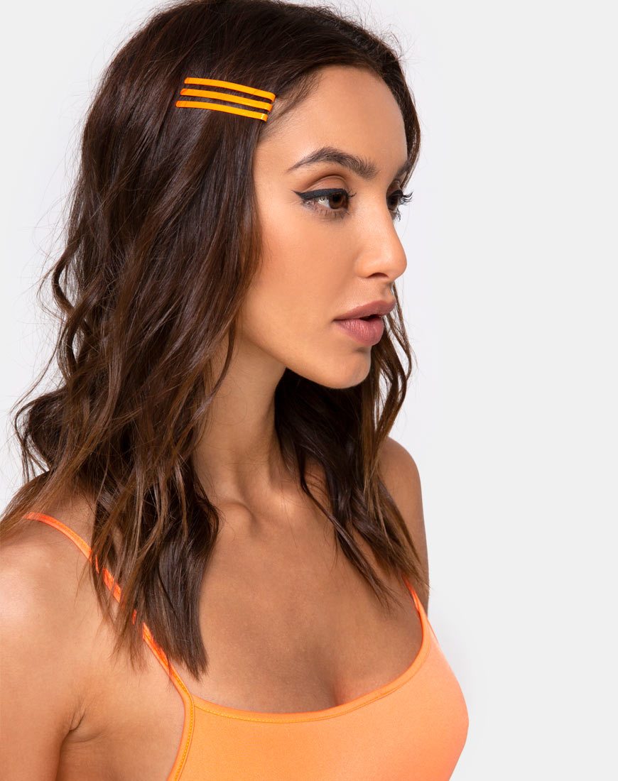 Image de l'ensemble de pinces à cheveux néon en orange