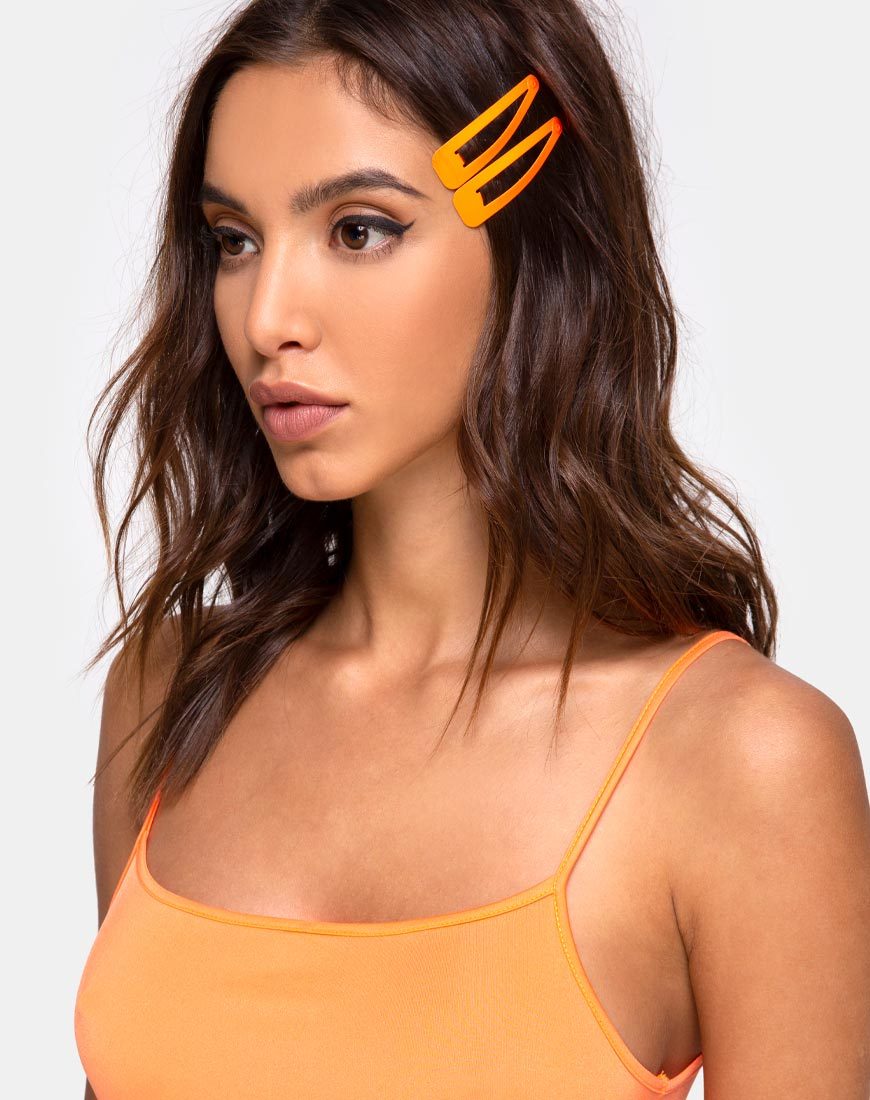 Image de l'ensemble de pinces à cheveux néon en orange