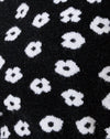 Tricot noir marguerite blanc
