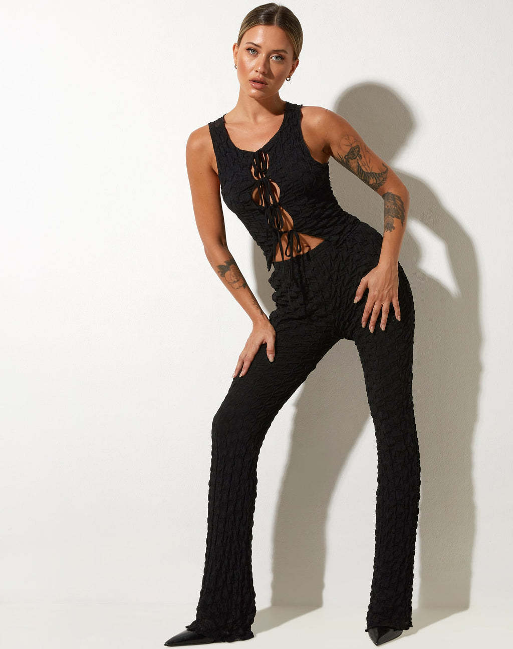 Pantalon évasé Herly en maille rayée Noir