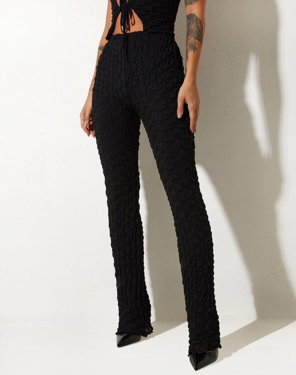 Pantalon évasé Herly en maille rayée Noir