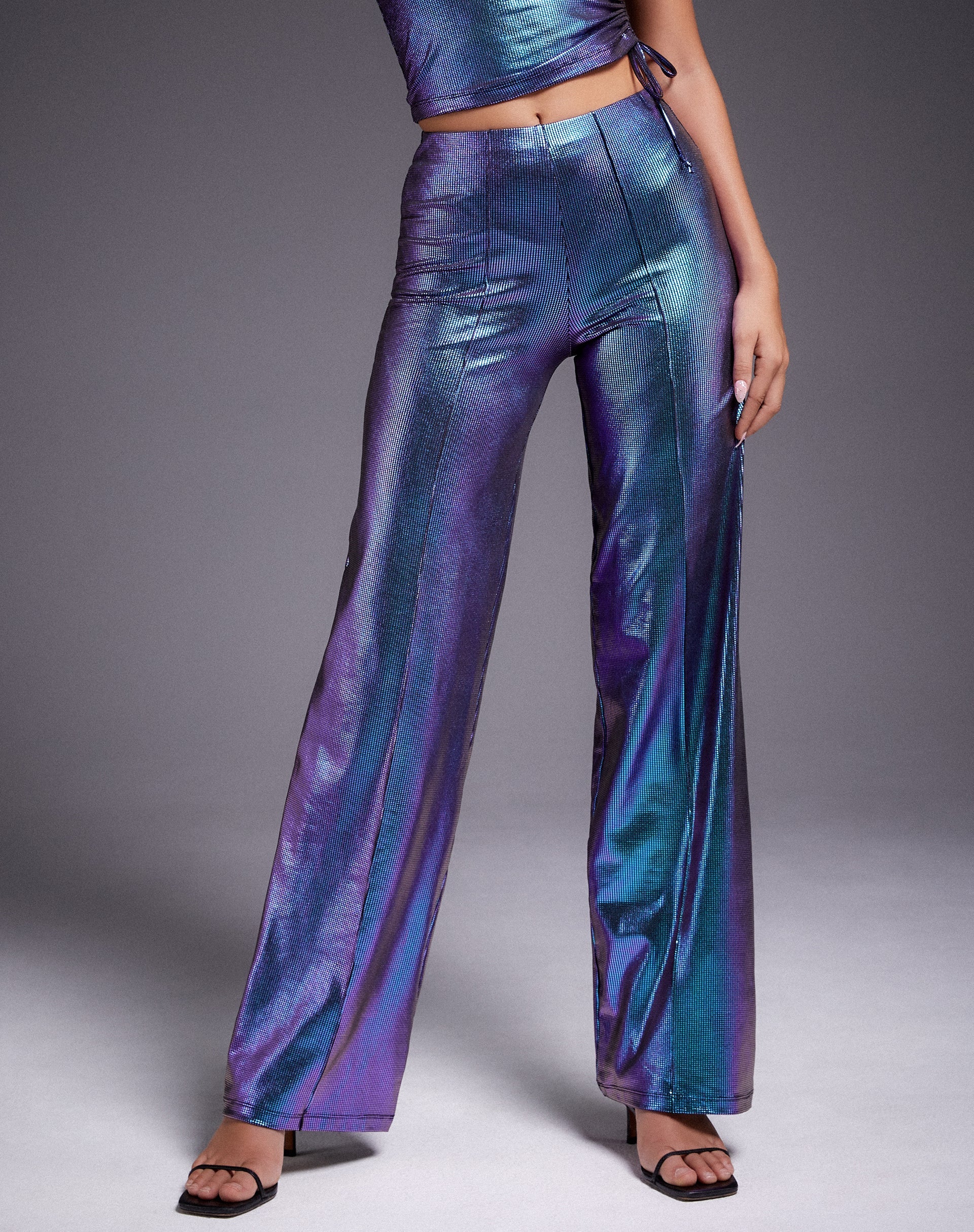 Image du pantalon Pista en violet holographique