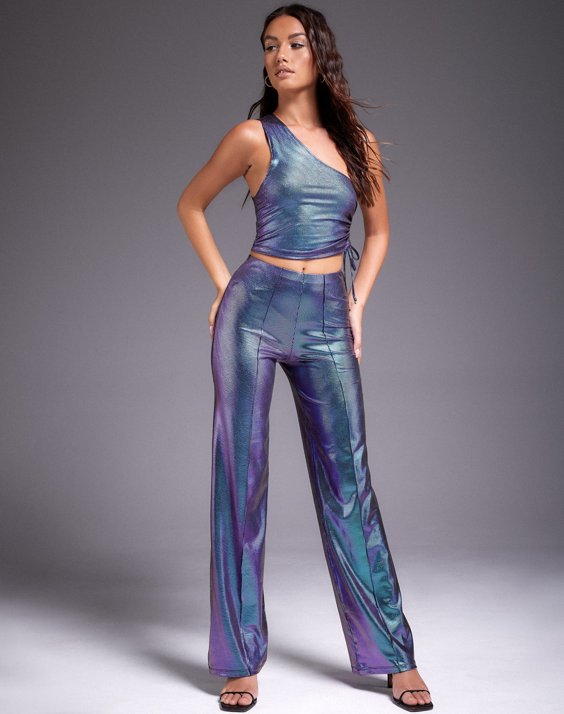 Image du pantalon Pista en violet holographique