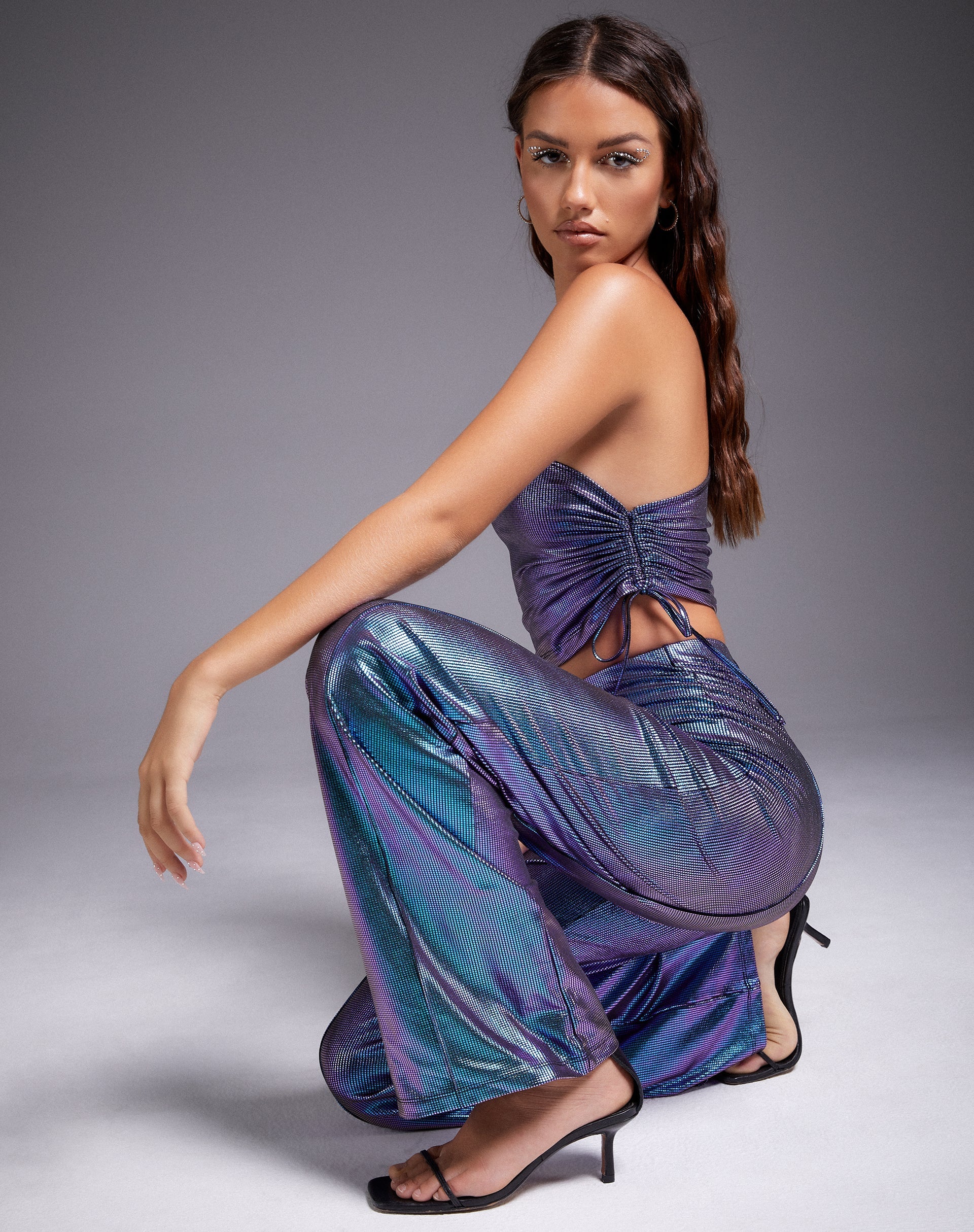 Image du pantalon Pista en violet holographique