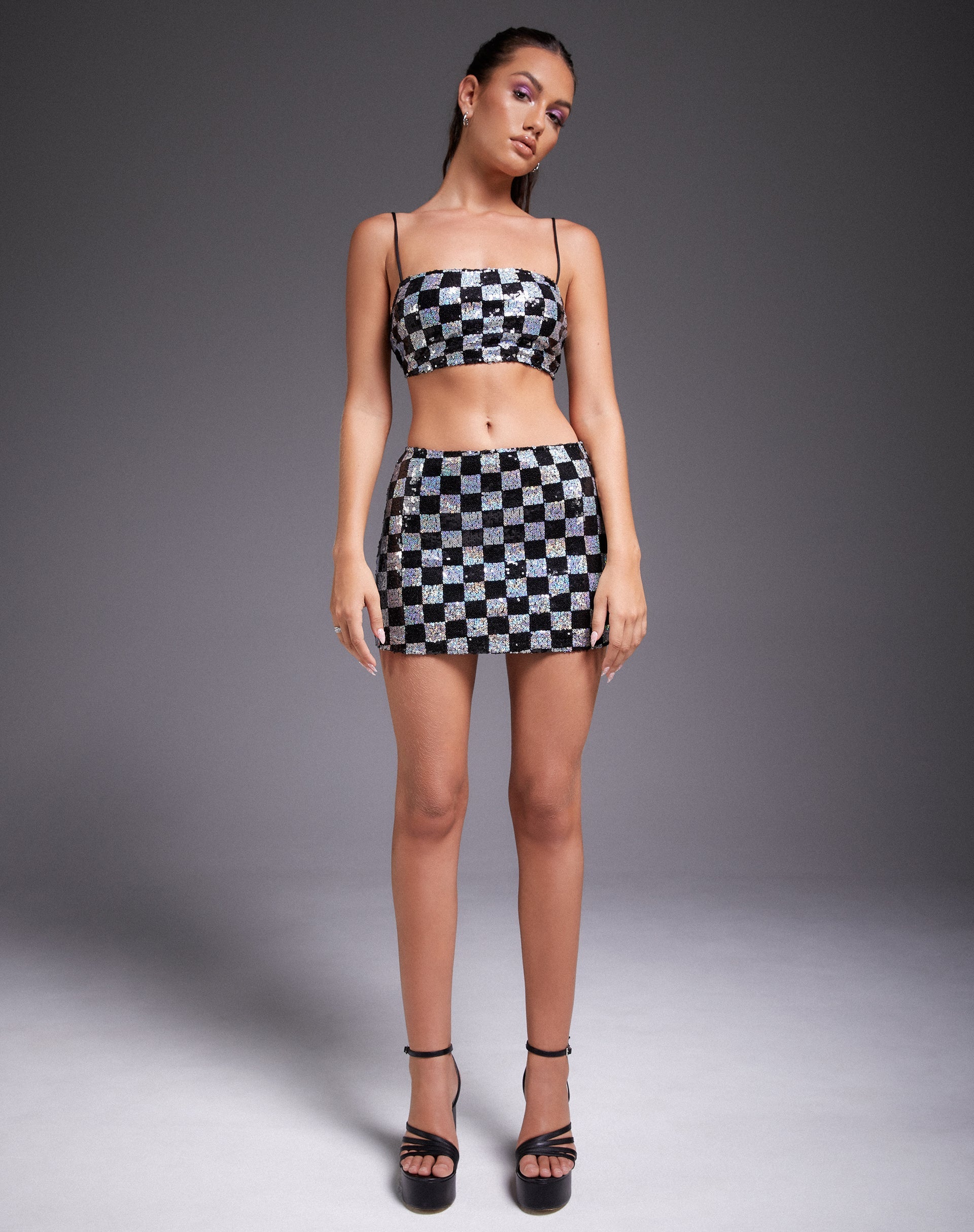 Image de Sazip Mini jupe en damier à paillettes noir et argent