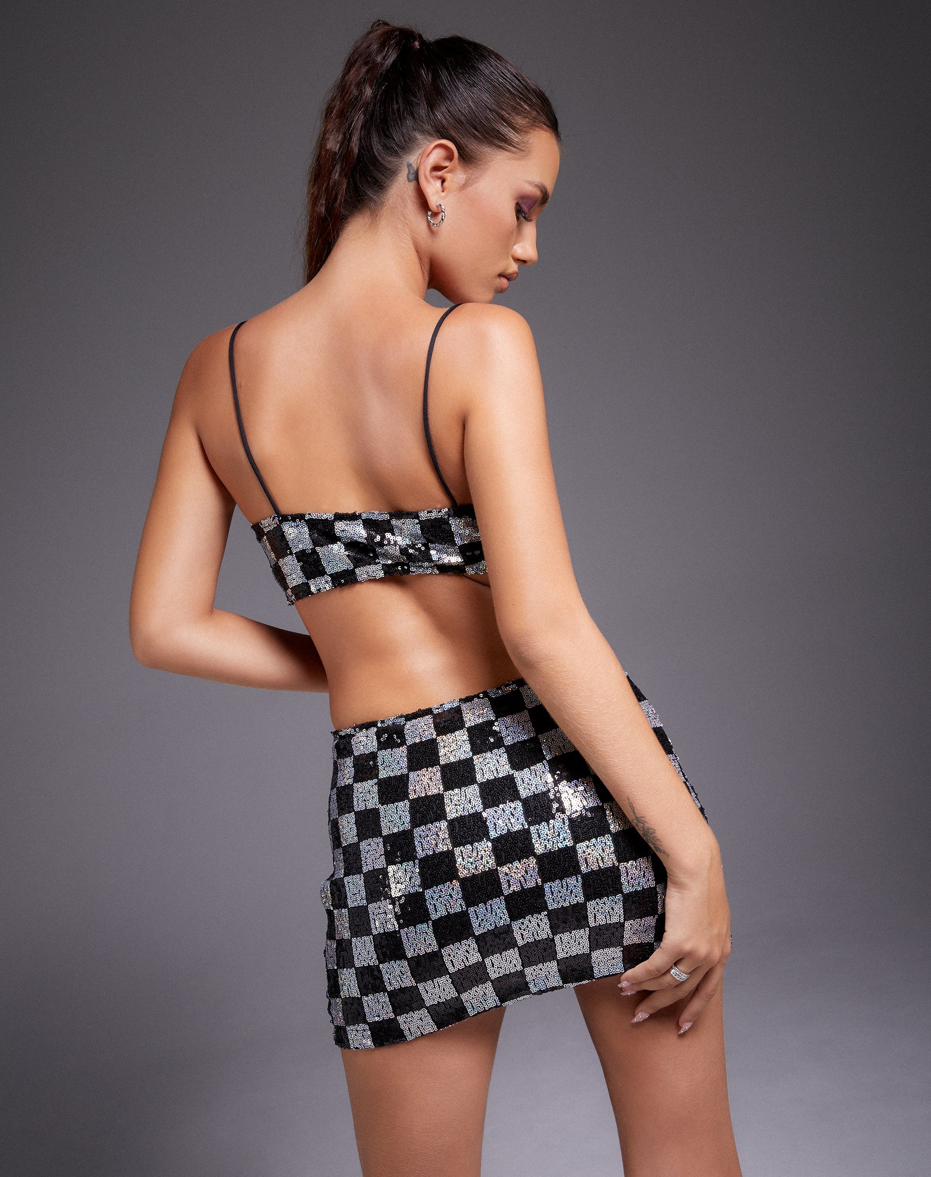 Image de Sazip Mini jupe en damier à paillettes noir et argent