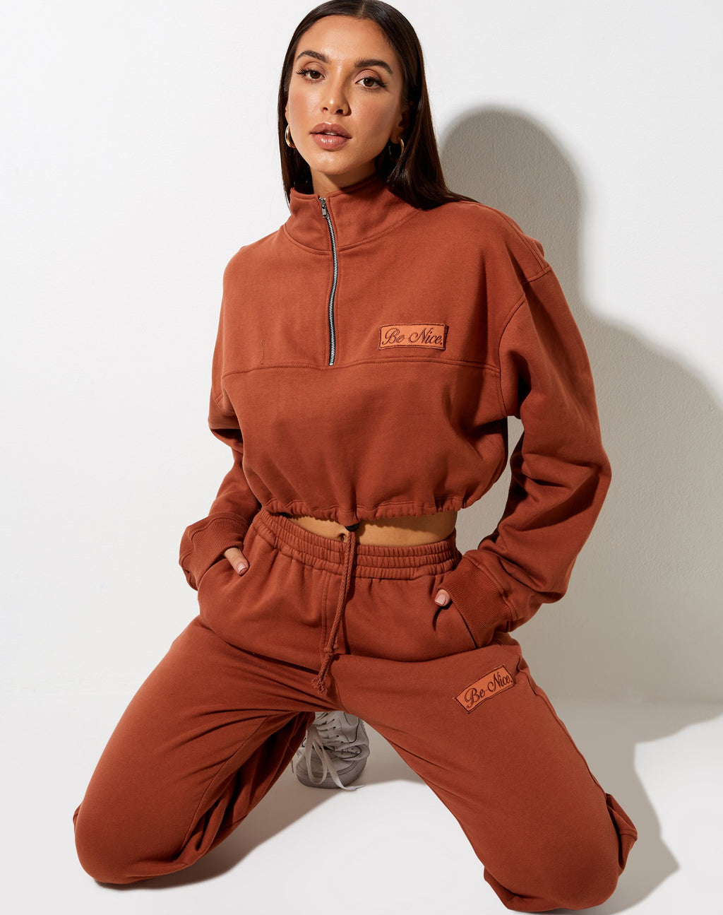 Pull Nar Zip Bungee Jumper in Burnt Brick 'Be Nice' Label Embro