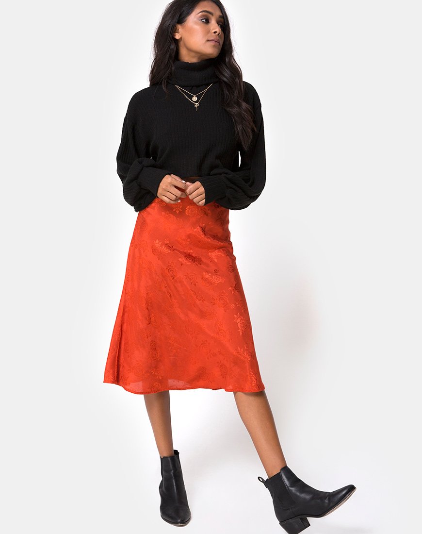Image de la jupe midi Tauri en satin rose rouille