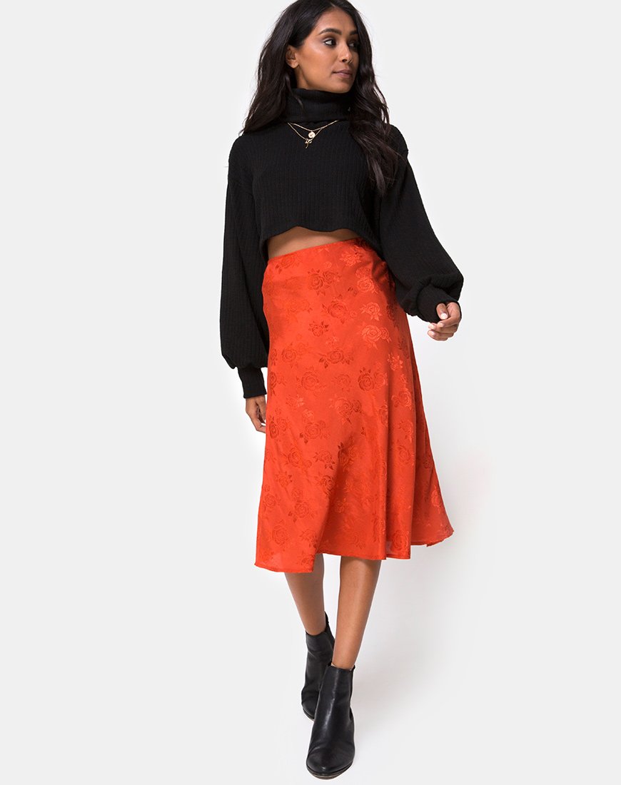 Image de la jupe midi Tauri en satin rose rouille