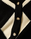 Harlequin noir et blanc cassé