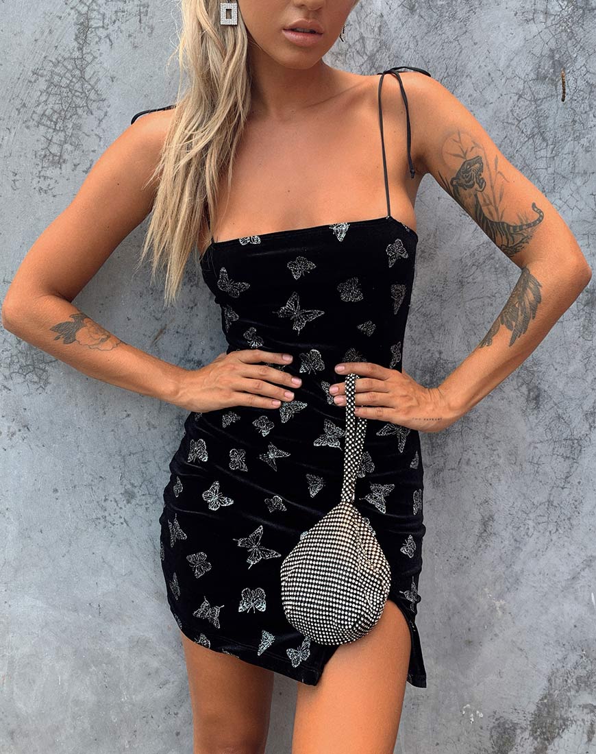 Image de la robe Verso en noir avec papillon pailleté