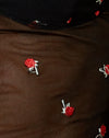 Noir avec broderie de roses rouges.