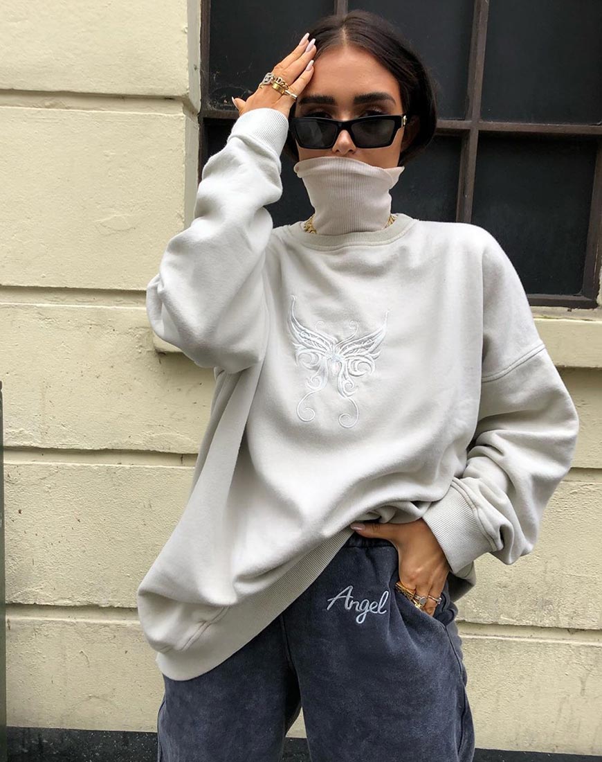Sweatshirt Glo en écru avec broderie papillon